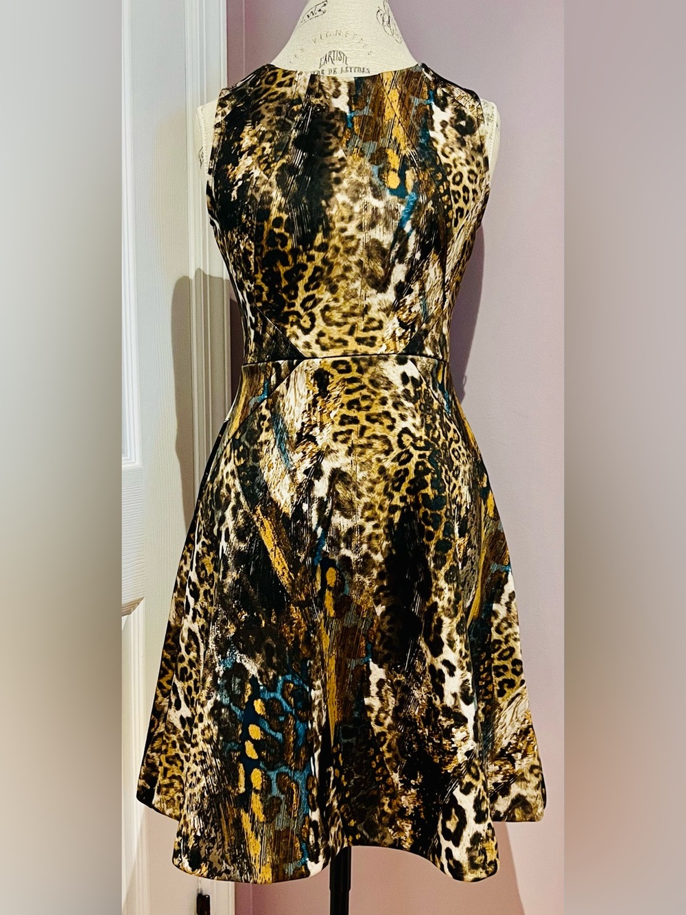Jennifer Lopez fit animal print dress